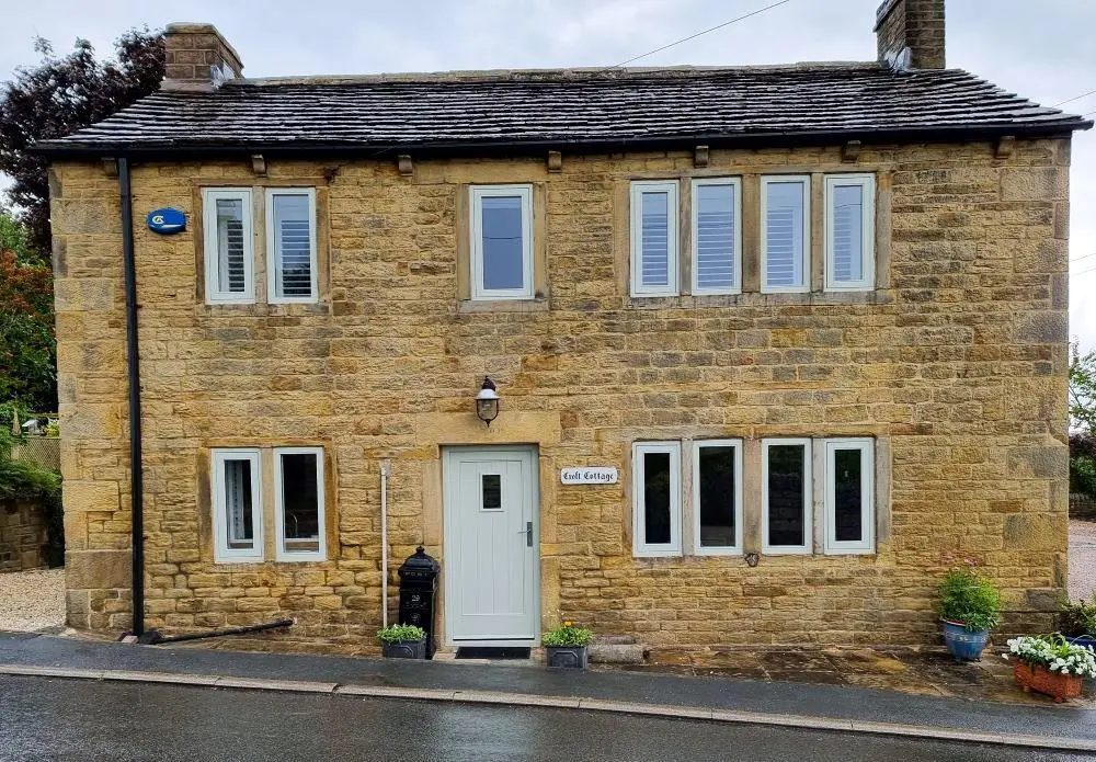 Stone cottage in Farnley Tyas with new flush casement windows